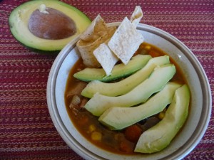 Southwest Chicken Soup with avocado and tortilla strips