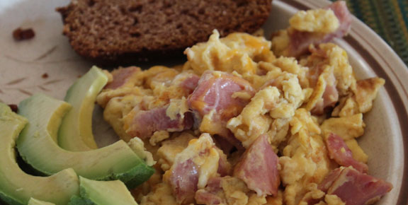 Breakfast ham and eggs with avocados