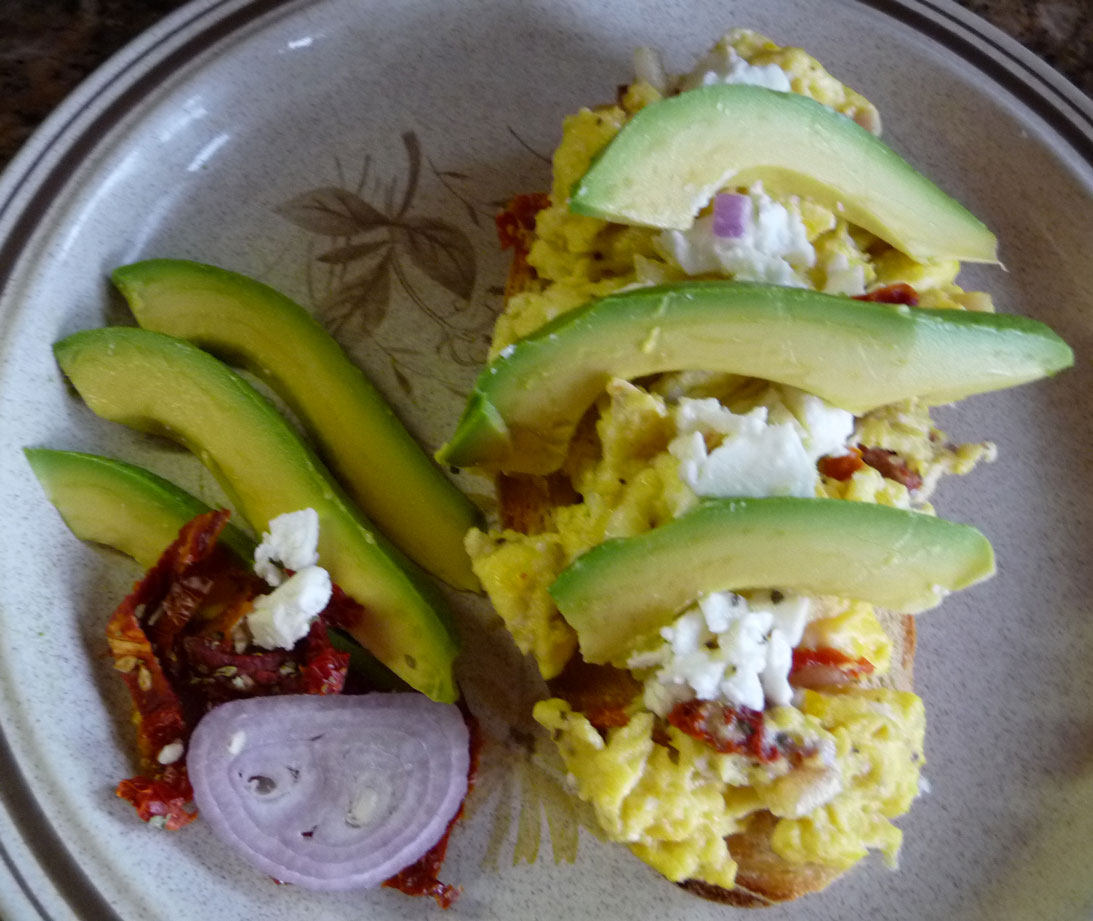 Scramble on Toast with Avocados, Sundried Tomatoes and Feta