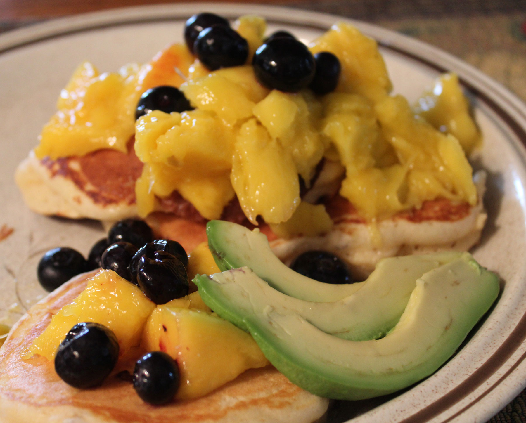 Mango and Blueberry Pancakes with avocado