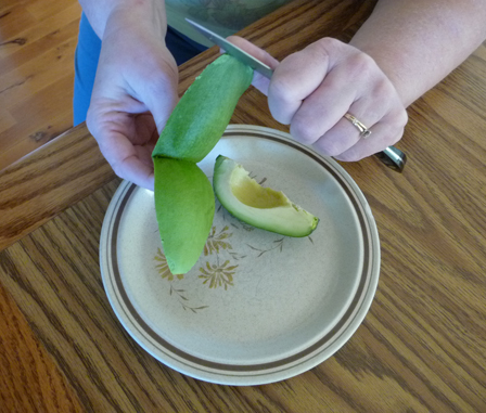 peeling a Fuerte avocado