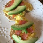 Fuerte avocados with smoked salmon and eggs on an English muffin